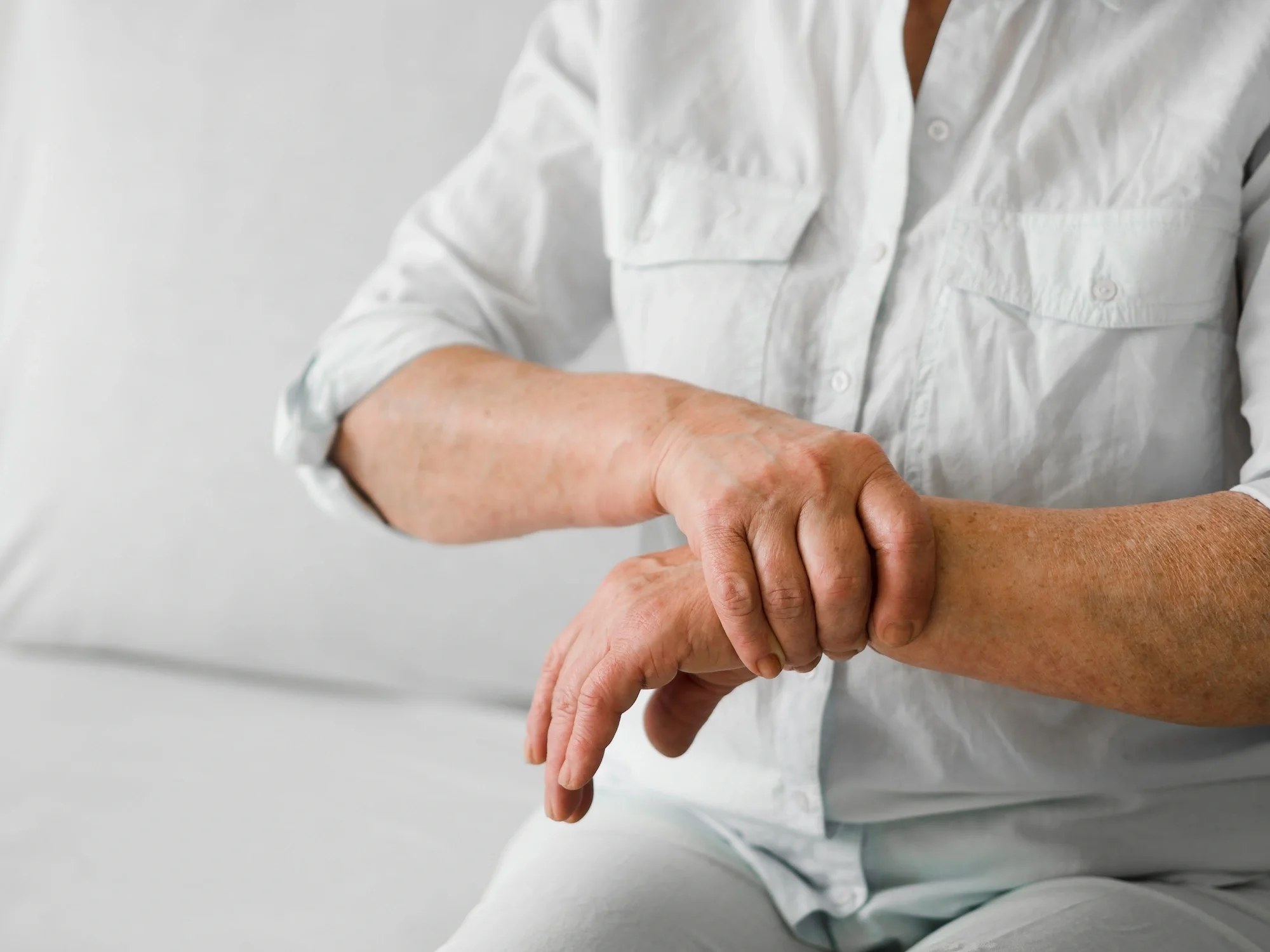 a person holding her wrist